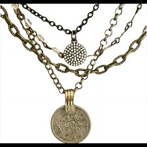 A local artisan handcrafted this unique layered necklace. Original One-a-Kind.